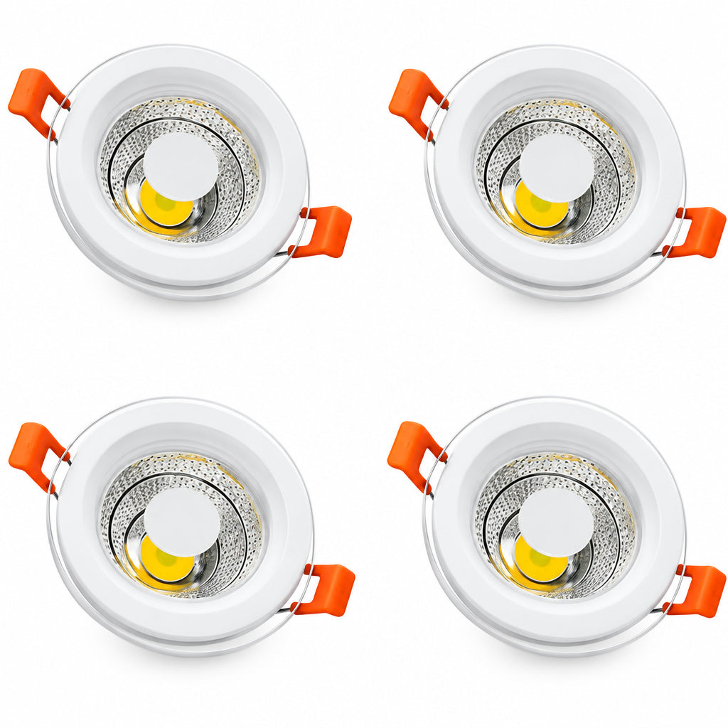 أربعة سبوتات LED دائرية بواجهات زجاجية وإطارات بيضاء ومشابك تثبيت برتقالية، مرتبة في صفين
